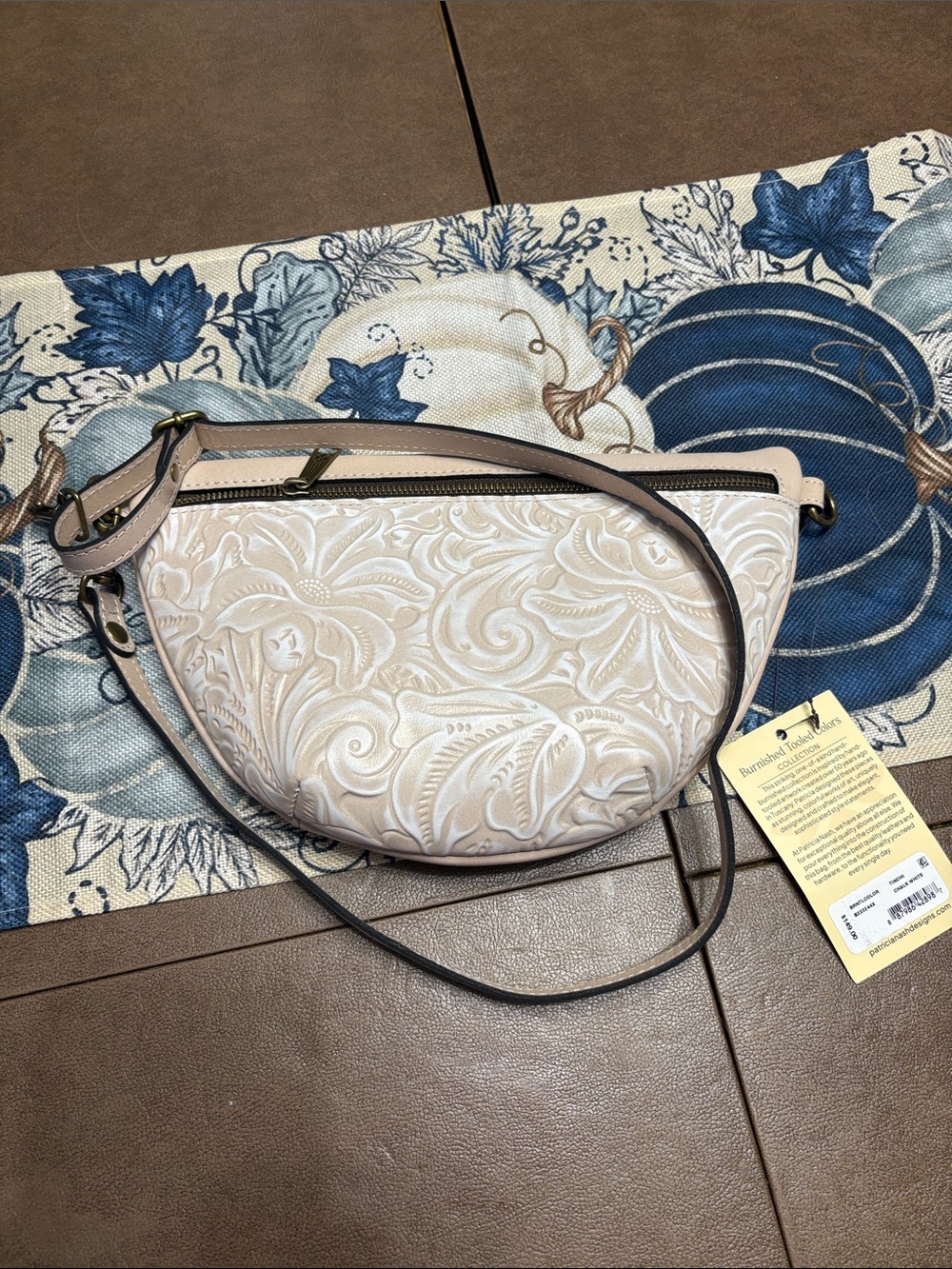 NWT Patricia Nash Embossed Floral Half-Moon Crossbody in Light Cream and Taupe